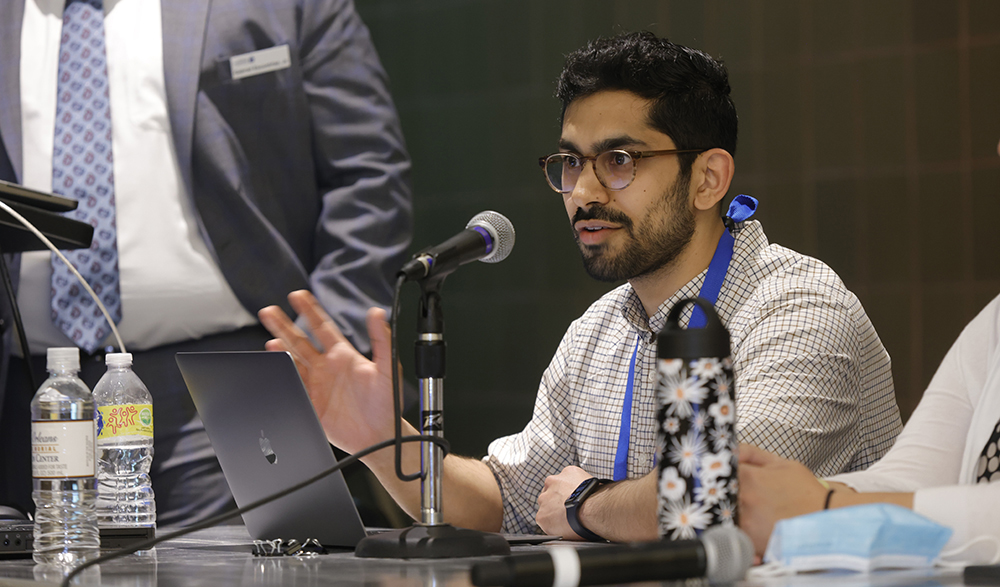 APAF Fellow speaking into microphone