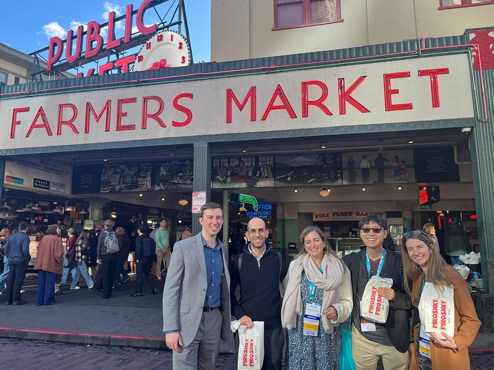 Group picture in front of farmers market