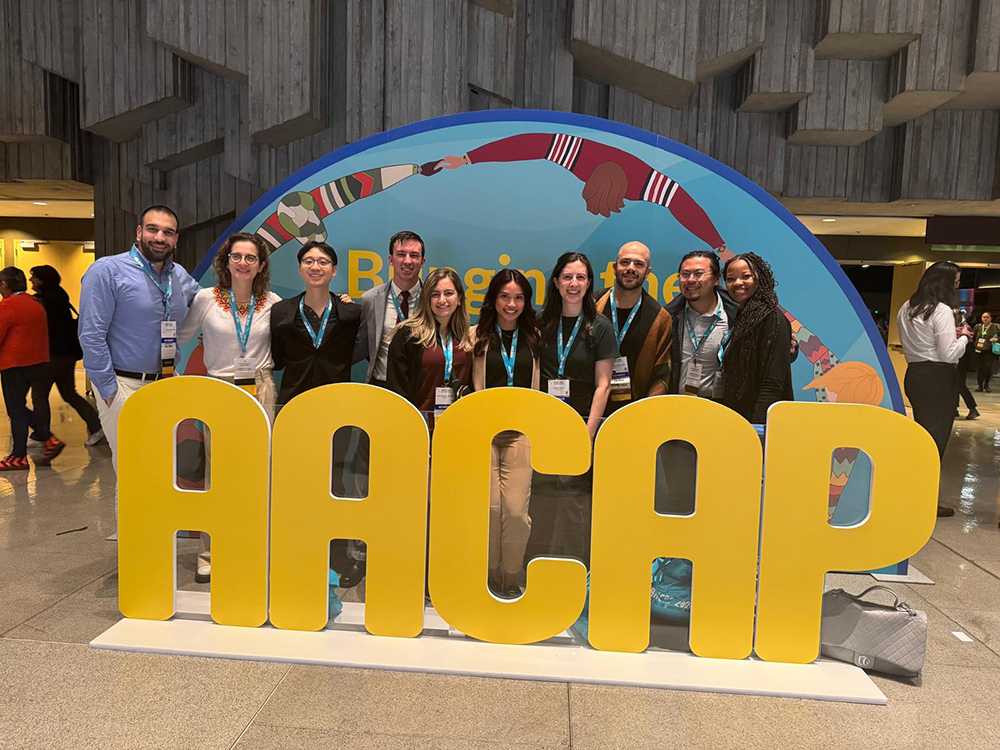 Group picture with the AACAP sign