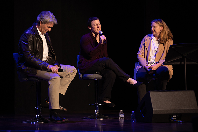 Three people speaking on stage at Where We Play: Nashville