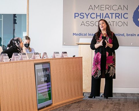 Photo of Farha Abbasi, M.D. speaking in boardroom