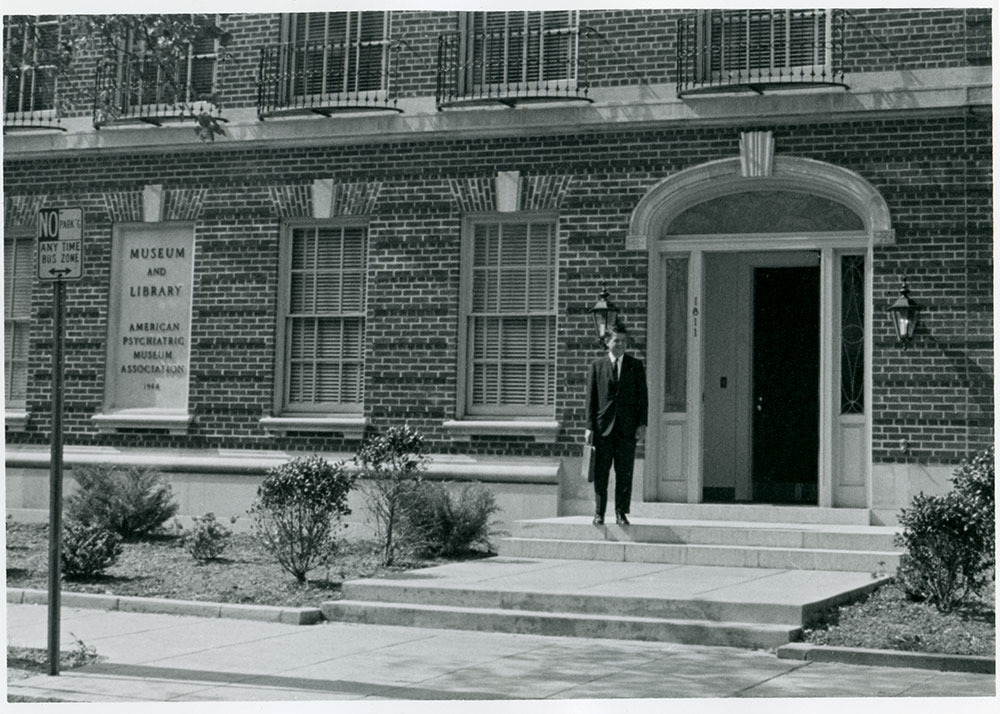 Man standing outside of building