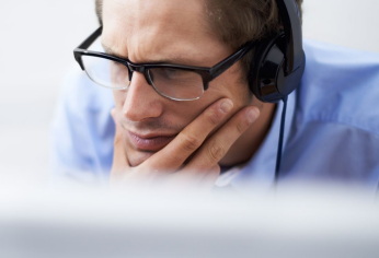 Man looking at computer screen