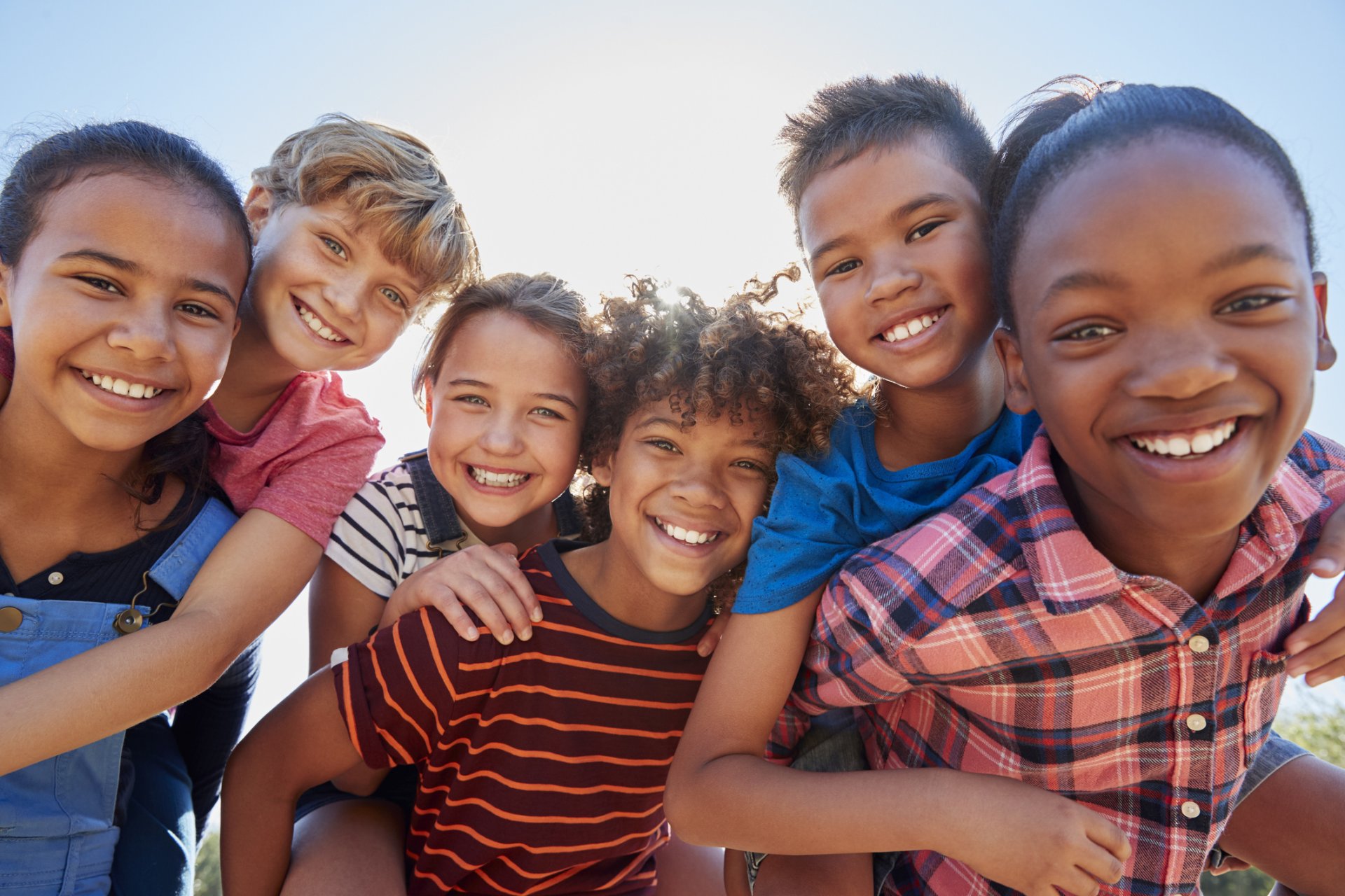 group of children smiling at the camera